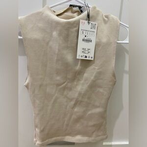 Beige sleeveless top